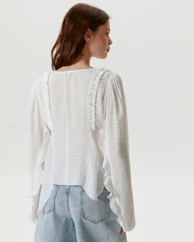 Блуза с асимметричными воланами молочного цвета